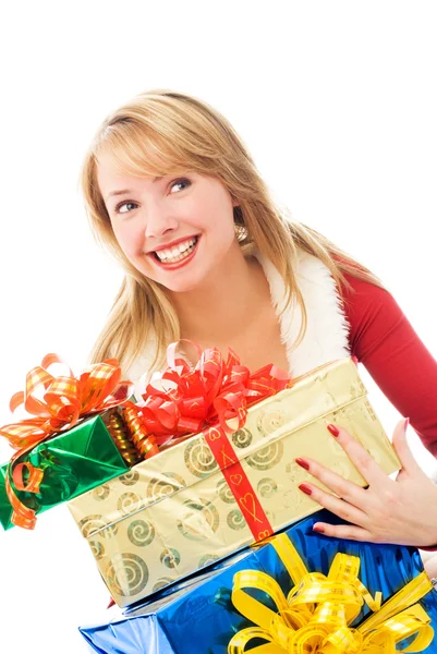 Surprised girl who has just got many Christmas p — Stock Photo, Image