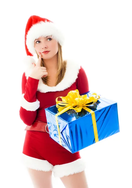 Ładna dziewczyna wybiera Boże Narodzenie prezenty — Zdjęcie stockowe