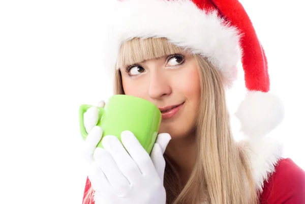 Dromerige meisje met een kopje thee — Stockfoto