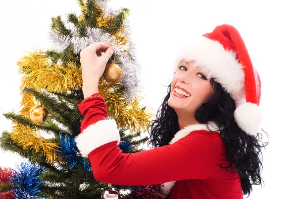 クリスマスを飾る美しいブルネットの女性 — ストック写真