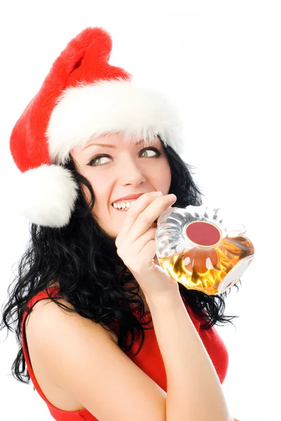 Beautiful brunette woman drinking cognac — Stock Photo, Image