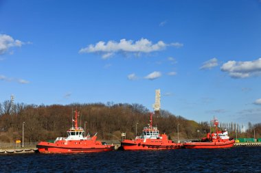 Tugboats in port clipart