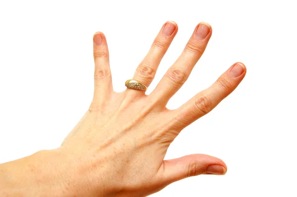 Γυναίκα χέρι με χρυσό δαχτυλίδι — Φωτογραφία Αρχείου
