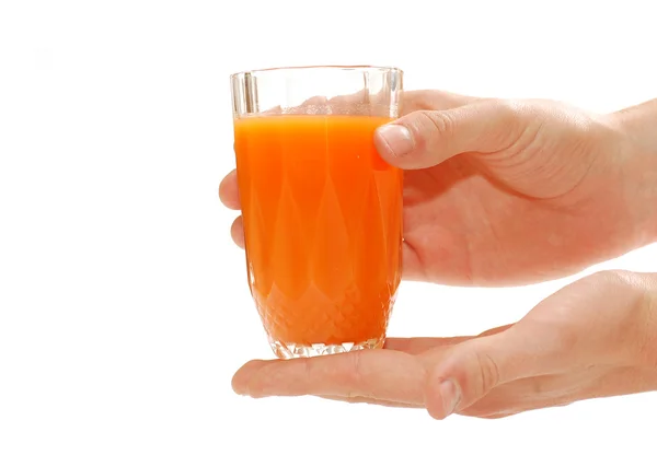 Mano con zumo de fruta — Foto de Stock