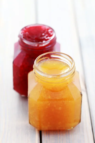 Orange and raspberry jam — Stok fotoğraf