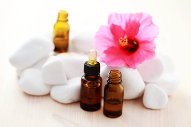 Hibiscus essential oil clipart