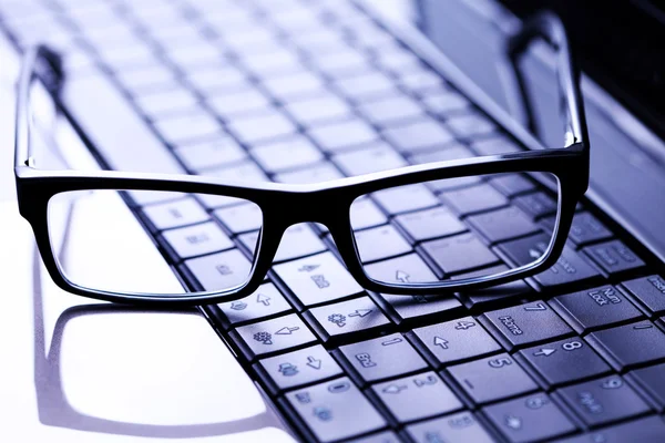 stock image Glasses on laptop