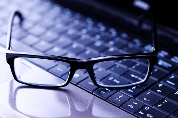 stock image Glasses on laptop