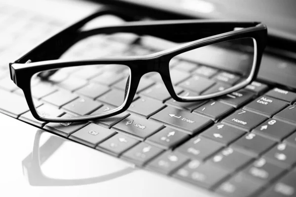 Stock image Glasses on laptop