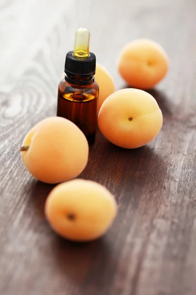 Apricot essential oil — Stock Photo, Image