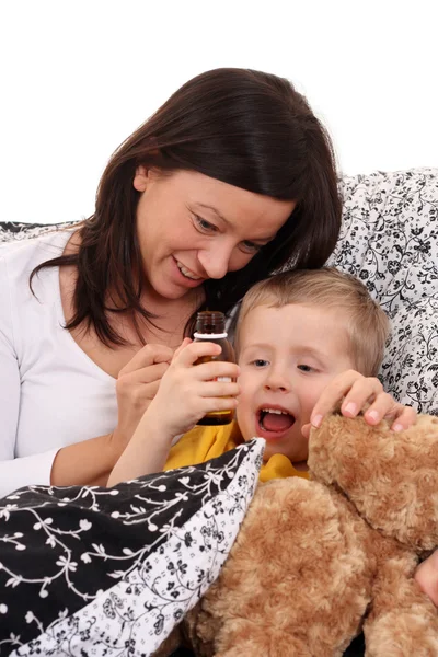 Child and syrup — Stock Photo, Image
