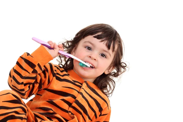 Chica y cepillo de dientes — Foto de Stock