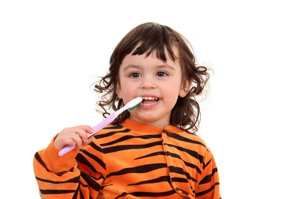 Dziewczyna i szczoteczka do zębów — Zdjęcie stockowe