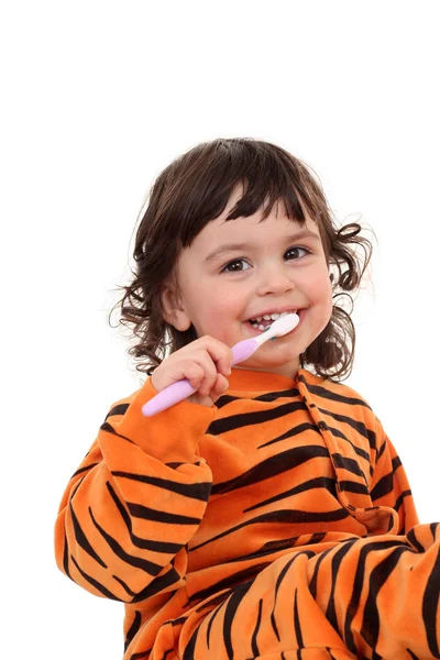 Chica y cepillo de dientes — Foto de Stock