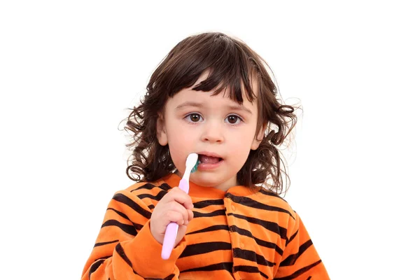 Girl and tooth-brush Stock Image