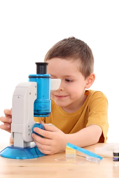 Boy with microscope — Stock Photo, Image