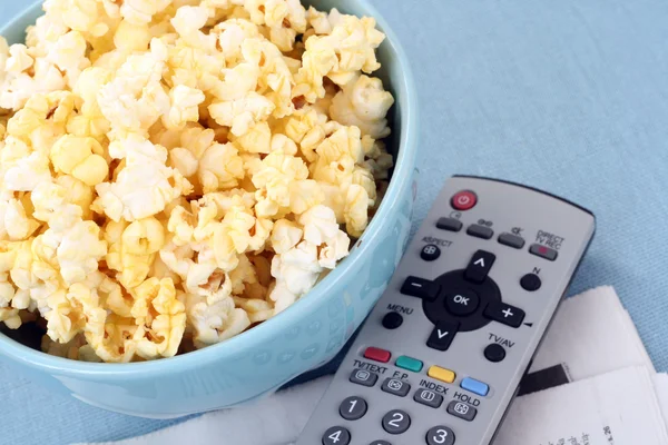 stock image Bowl of popcorn and remote control