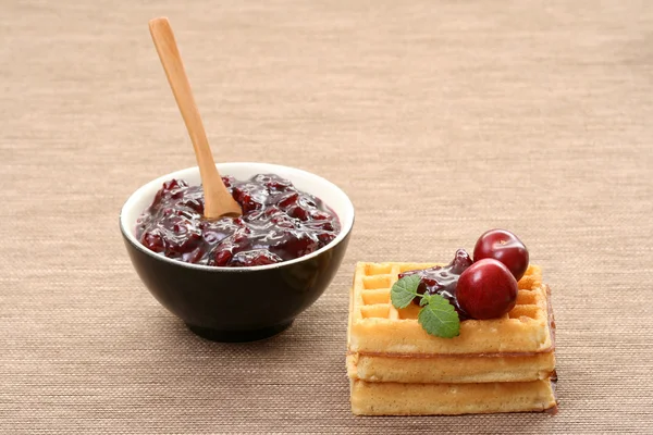 Waffles and fresh cherry jam — Stock Photo, Image