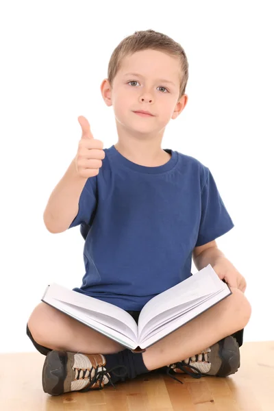 Junge mit Buch — Stockfoto