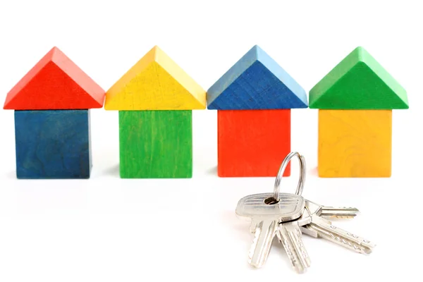 Huizen en sleutels — Stockfoto