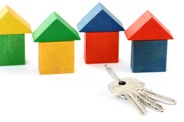 Családi házak és kulcsok — Stock Fotó