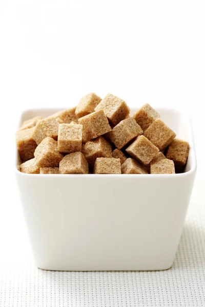 Cubos de açúcar mascavo — Fotografia de Stock