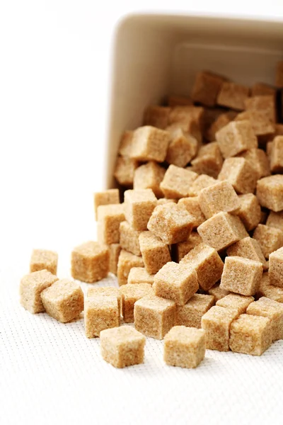 Cubos de açúcar mascavo — Fotografia de Stock