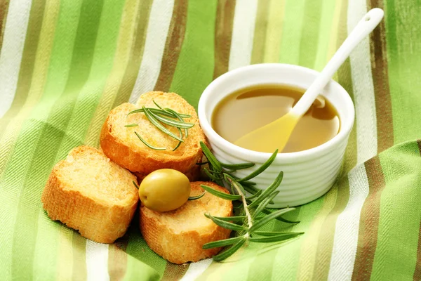 Baguette and olive oil — Stock Photo, Image