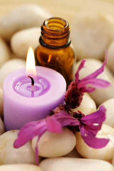 Massage Oil Candle Lavender Flowers Stones Relaxing Time — Stock Photo, Image