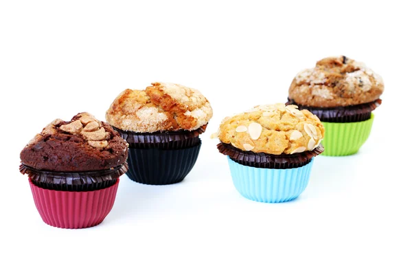 Vier Muffins Geïsoleerd Wit Zoete Voedsel — Stockfoto