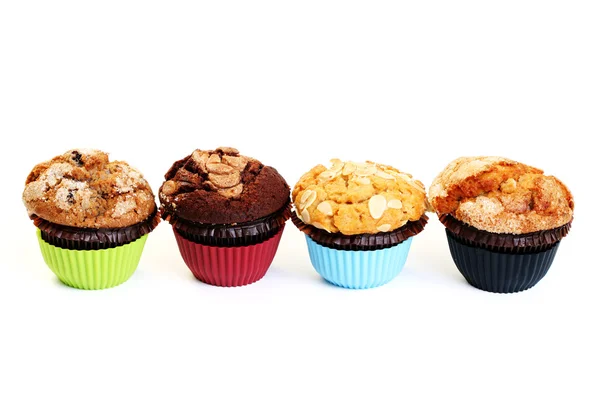 Čtyři Muffiny Izolovaných Bílém Sladká Jídla — Stock fotografie