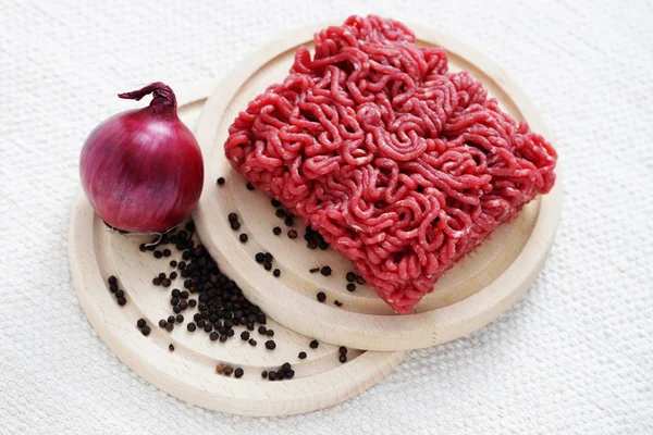 stock image fresh beef meat with black pepper and onion - food and drink