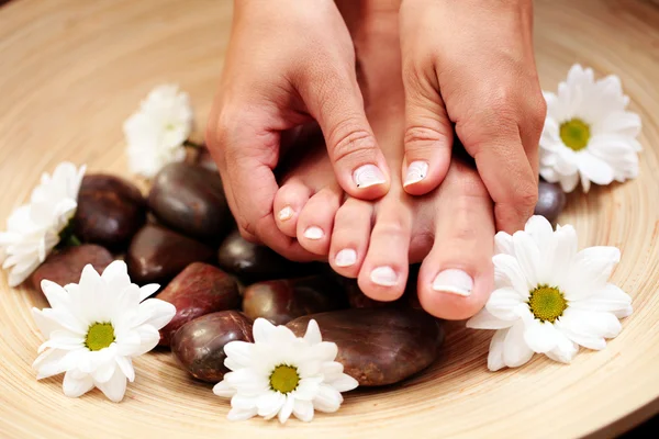 Female Feet Pebbles Flowers Beauty Treatment — Stock Photo, Image