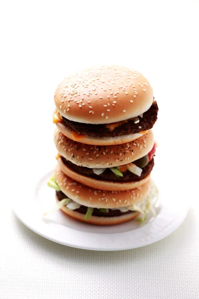 Pilha de hambúrgueres — Fotografia de Stock