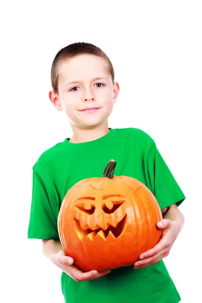 stock image 8 years old boy with Halloween pumpkin on white background - family and kids