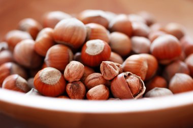 bowl full of hazelnuts - food and drink clipart