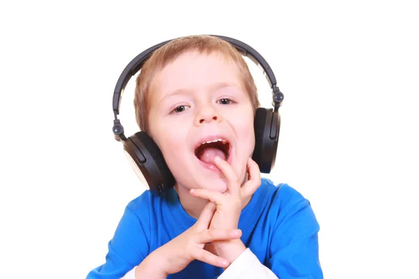 Niño con auriculares —  Fotos de Stock