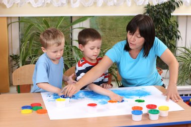 Preschoolers and fingerpainting clipart