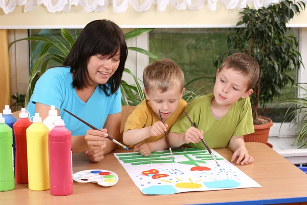 Teacher Two Preschoolers Colorful Painting Education — Stock Photo, Image