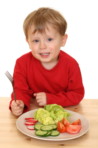 Хлопчик і овочів — стокове фото