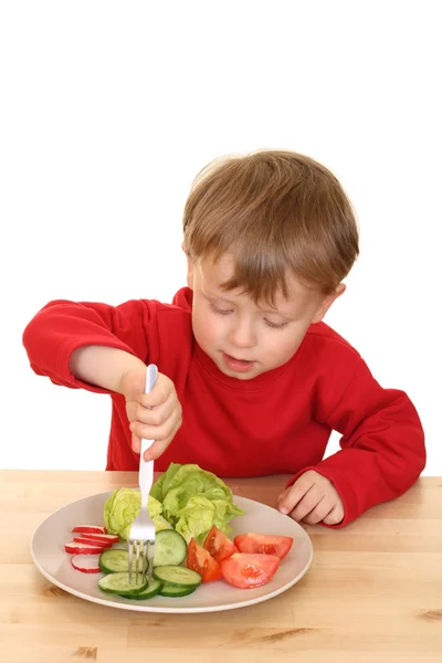 Junge und Gemüse — Stockfoto