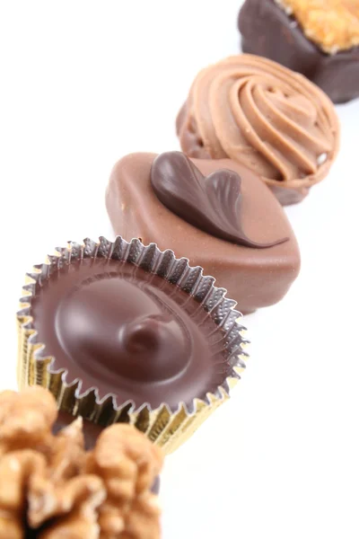 Row Mixed Chocolates Isolated White — Stock Photo, Image