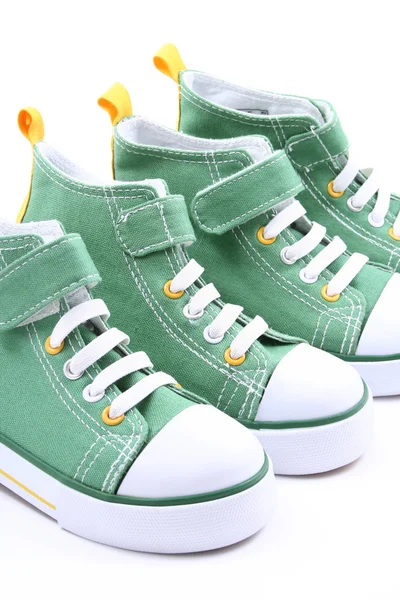 Twee Paren Van Groene Sneakers Voor Kinderen Close Ups — Stockfoto