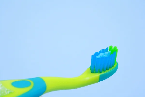 Bunte Zahnbürste Für Kinder Isoliert Auf Blau — Stockfoto