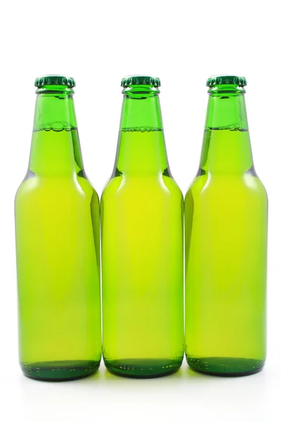 Три Пляшки Пива Ізольовані Білому — стокове фото