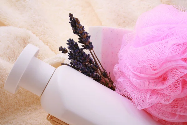 stock image close-ups of basket with shampoo lavender soap and sponge - beauty treatment