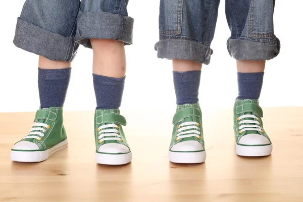 Four Children Legs Sneakers Floor — Stock Photo, Image