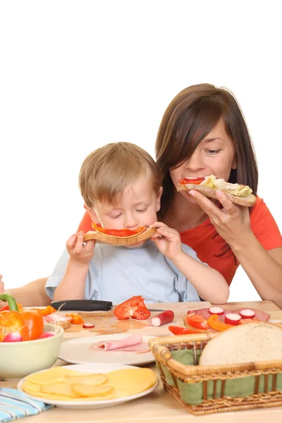 Drie Jaar Oude Jongen Ontbijten Met Moeder Geïsoleerd Wit — Stockfoto