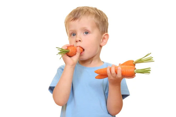 Três Anos Idade Menino Comendo Cenoura Fresca Isolada Branco — Fotografia de Stock