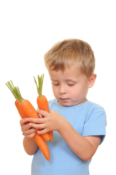 Criança e cenoura — Fotografia de Stock